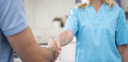 close-up-doctor-patient-shaking-hands